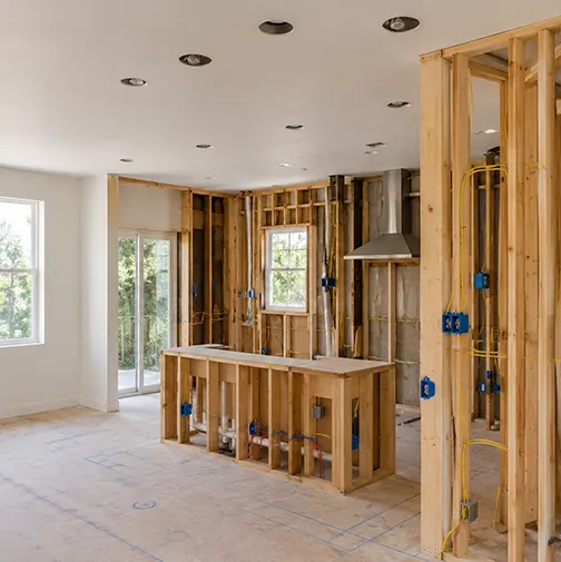 Residential home renovation with new electrical wiring, outlet boxes, and lighting rough-in installation